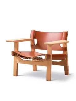 Den Spanske Stol i mørkebrun læder, eg olie af Børge Mogensen