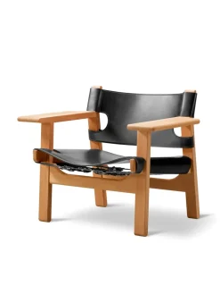 Den Spanske Stol i sort læder, eg sort lak af Børge Mogensen