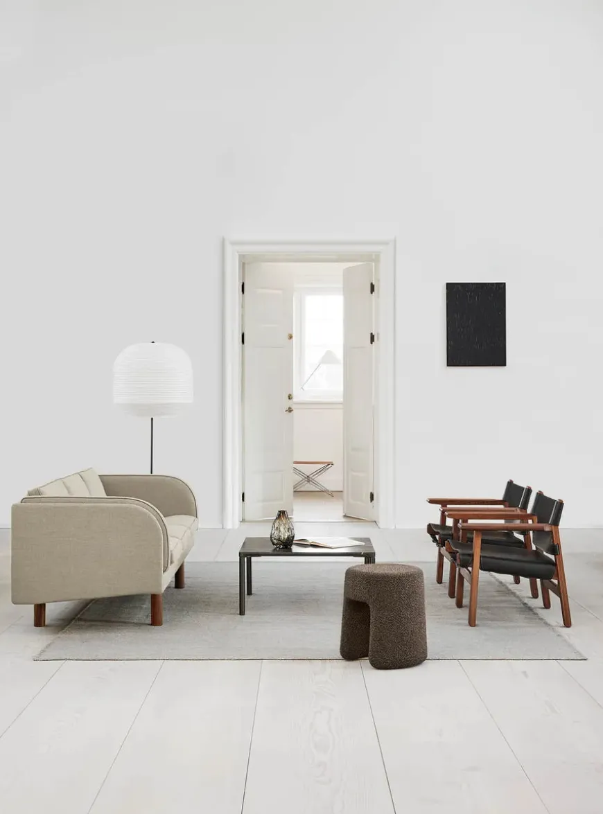 Den Spanske Stol i sort læder, eg sort lak af Børge Mogensen