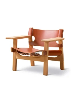 Den Spanske Stol i sort læder, eg olie af Børge Mogensen