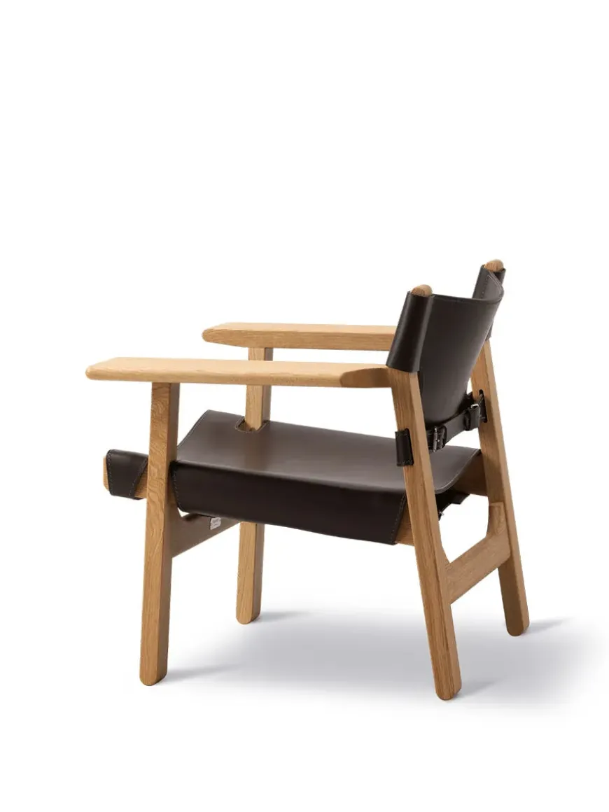 Den Spanske Stol i sort læder, eg olie af Børge Mogensen