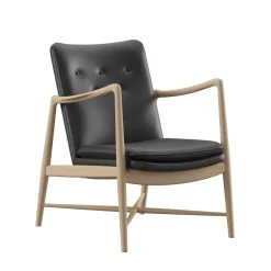 Kaminstolen, eg olie af Finn Juhl