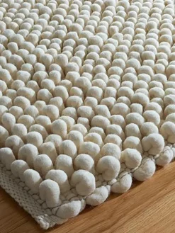 Olbia Perla tæppe fra Tisca