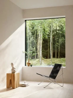 PK4 Loungestol i natur, stålstel af Poul Kjærholm