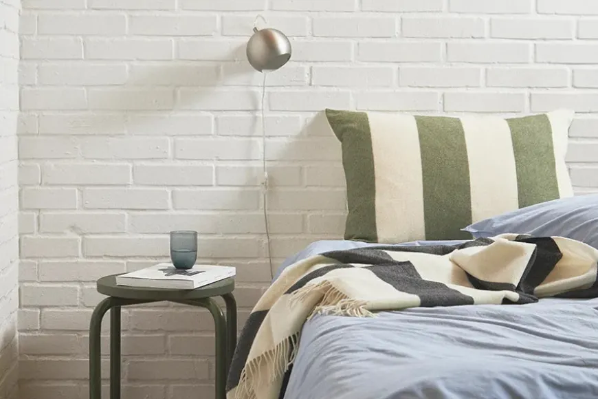 The Sweater Cushion, orange fra Silkeborg Uldspinderi
